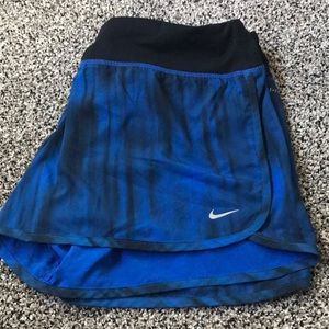 blue NIKE running shorts